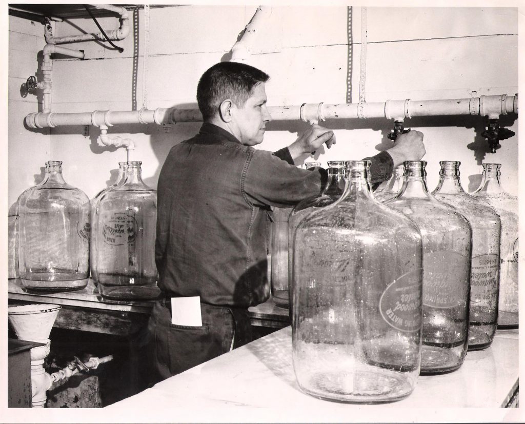 Don Ormsby bottling water in old building 1959 Collingwood Water Toledo Ohio